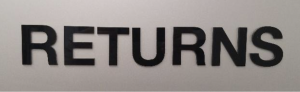 The picture is of a metallic library sign with the word "RETURNS" in black lettering.