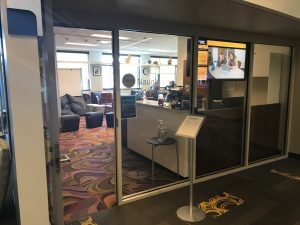 Image 1: “The glass front entrance of Georgia Tech’s Naugle Communication Center gives the center a more open and accessible feeling”